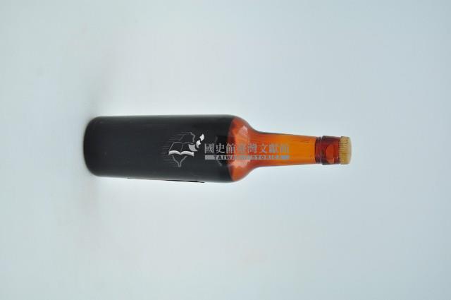 橘酒樣品棗色透明玻璃小型酒瓶藏品圖，第2張