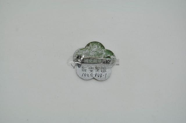 臺灣省教育會頒發之誨人不倦胸章藏品圖，第2張