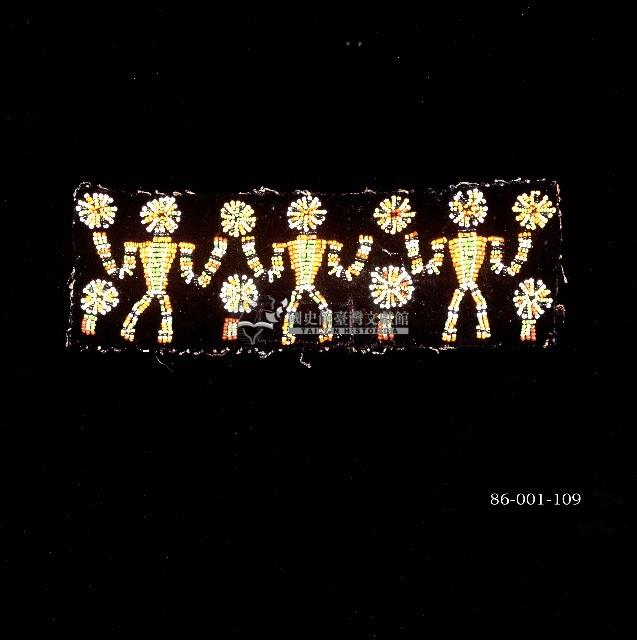 排灣族人像圖飾深色布匹藏品圖，第1張