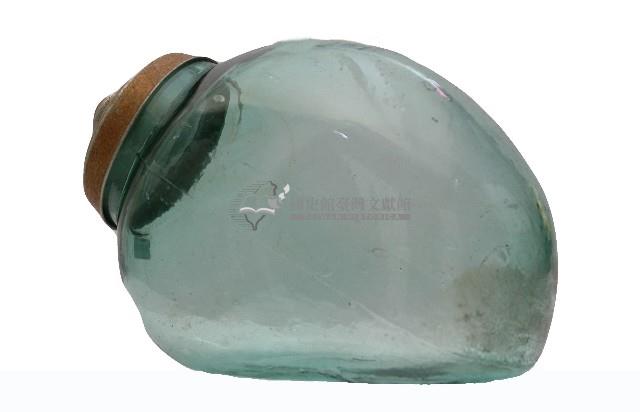 淡青綠色傾斜式金屬蓋透明玻璃罐藏品圖，第1張