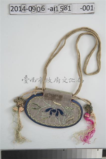 褐底橢圓形花卉紋煙絲袋藏品圖，第1張