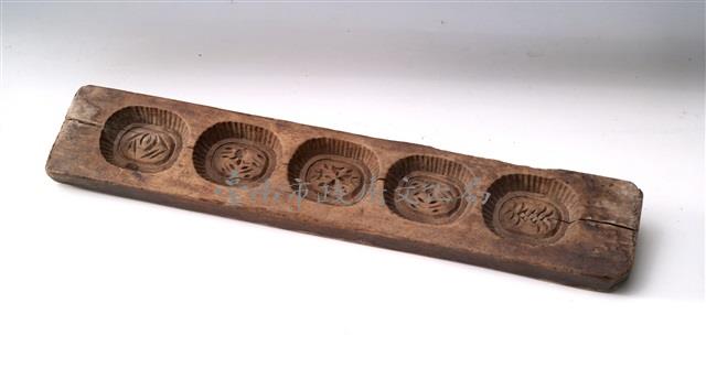 長條板單面陰雕橢圓形糕印藏品圖，第1張