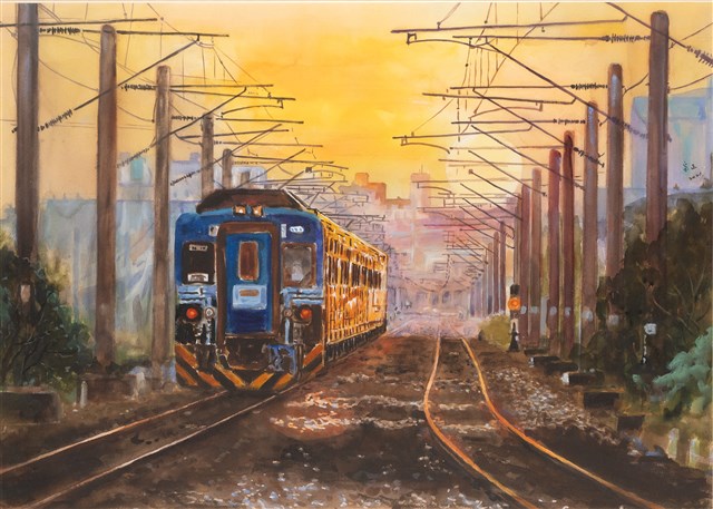 夕陽下的電聯車的圖片