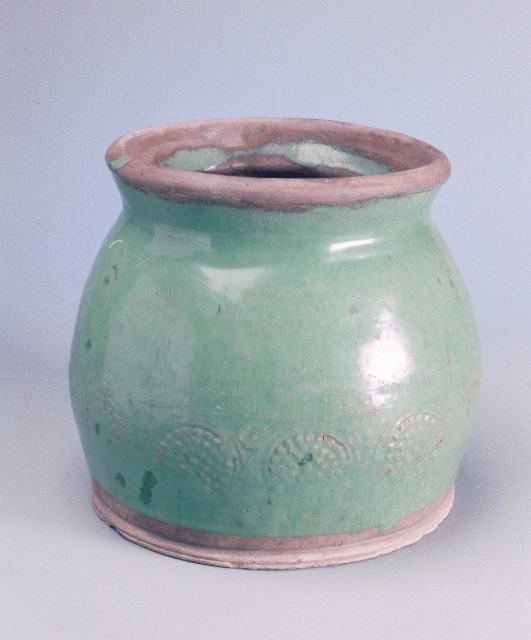 Flower patterned green glaze jug
