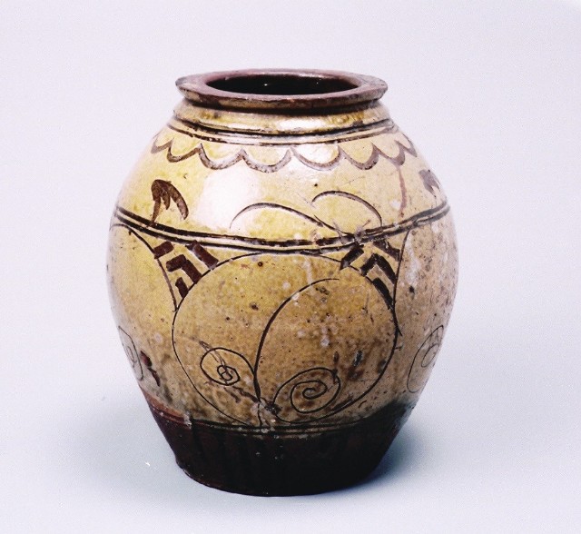 Oil urn