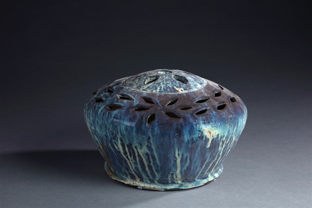 Pierced Blue Running Glaze Stove