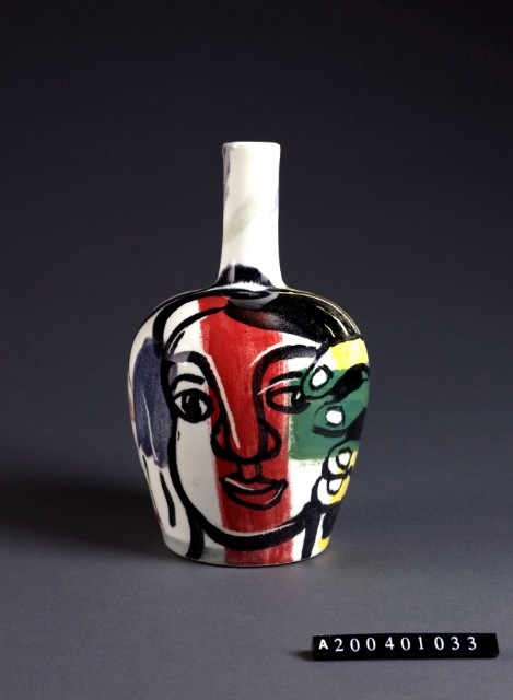 Long-necked painted vase with figure