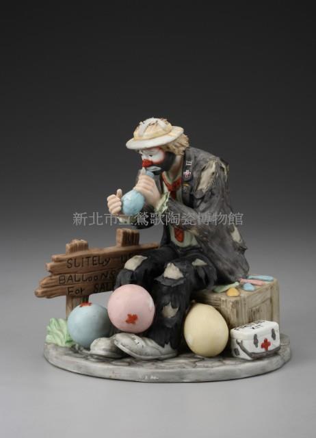 Clown Blowing a Balloon Collection Image