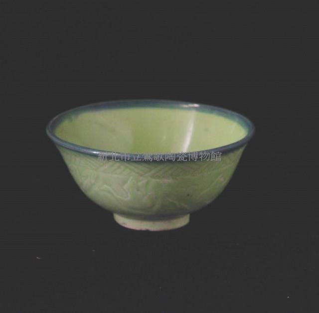 Bowl with Carved Linear Patterns in a Green Glaze Collection Image