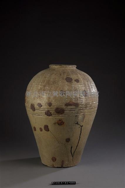 Staple-mended and green-glazed Urn Collection Image