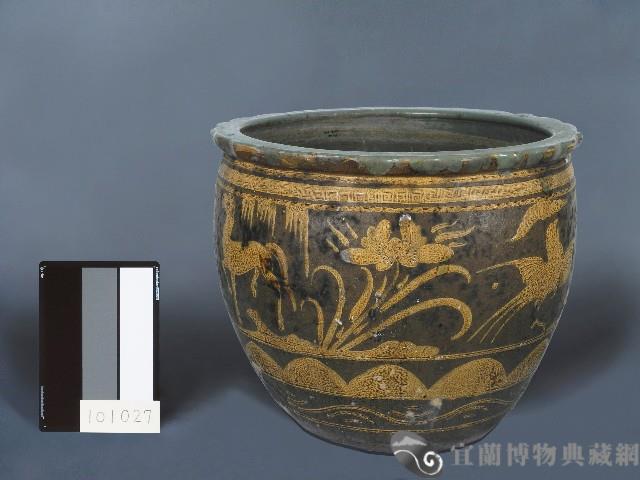 黃釉刻花鳥獸花卉紋水缸藏品圖，第1張